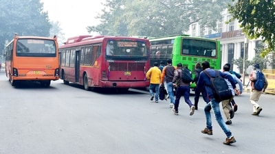 People run to catch a DTC bus at the Super Bazar bus stop at Rajiv Chowk, in New Delhi. (PTI/ Representative) People run to catch a DTC bus at the Super Bazar bus stop at Rajiv Chowk, in New Delhi. (PTI/ Representative)