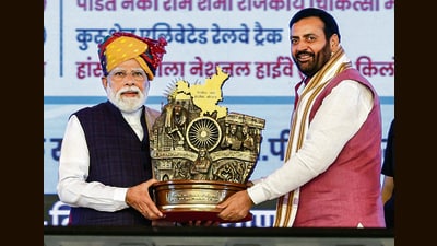 Prime Minister Narendra Modi being felicitated with a memento by Haryana chief minister Nayab Singh Saini in Jind on Friday. (PTI) Prime Minister Narendra Modi being felicitated with a memento by Haryana chief minister Nayab Singh Saini in Jind on Friday. (PTI)