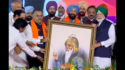 Punjab BJP chief Kewal Singh Dhillon, national general secretary Tarun Chugh and other leaders presenting a portrait of Maharaja Ranjit Singh to Prime Minister Narendra Modi in Jalandhar on Friday. (@NarendraModi) Punjab BJP chief Kewal Singh Dhillon, national general secretary Tarun Chugh and other leaders presenting a portrait of Maharaja Ranjit Singh to Prime Minister Narendra Modi in Jalandhar on Friday. (@NarendraModi)