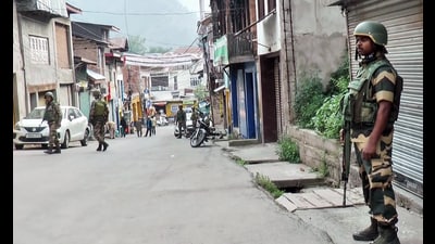 Security personnel stand guard in Doda on Friday. (ANI Video Grab) Security personnel stand guard in Doda on Friday. (ANI Video Grab)