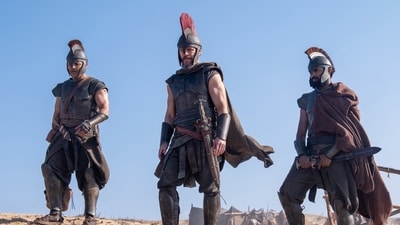 This image released by Universal Pictures shows, from left, Jimmy Gonzales ia Cepheus, Matt Damon as Odysseus and Himesh Patel as Eurylochus in a scene from "The Odyssey." (Via AP) This image released by Universal Pictures shows, from left, Jimmy Gonzales ia Cepheus, Matt Damon as Odysseus and Himesh Patel as Eurylochus in a scene from "The Odyssey." (Via AP)