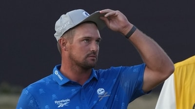 Bryson DeChambeau of the United States with his caddie Greg Bodine at the British Open Golf championships at Royal Birkdale golf club, in Southport, England, Friday, July 17. (AP Photo/Jon Super) Bryson DeChambeau of the United States with his caddie Greg Bodine at the British Open Golf championships at Royal Birkdale golf club, in Southport, England, Friday, July 17. (AP Photo/Jon Super)