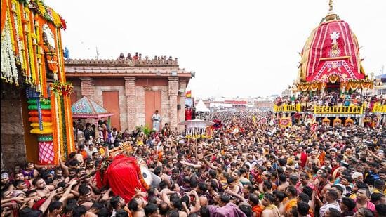 Devotees carry Lord Jagannath to the chariot as they participate in the Mahaprabhu Jagannath Rath Yatra in Puri. (X)