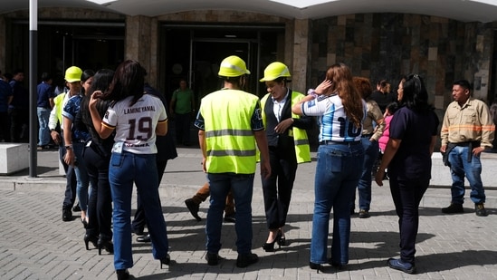 People evacuate a building after a powerful 7.4-magnitude earthquake struck off the coast of Mexico's southern state of Chiapas, triggering a tsunami warning and shaking buildings in neighboring Guatemala and El Salvador, in San Salvador, El Salvador, July 17, 2026. REUTERS/Jose Cabezas