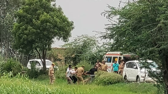 Police in action in Shikohabad area, Firozabad district, during a shootout with two wanted accused.(HT Photo)