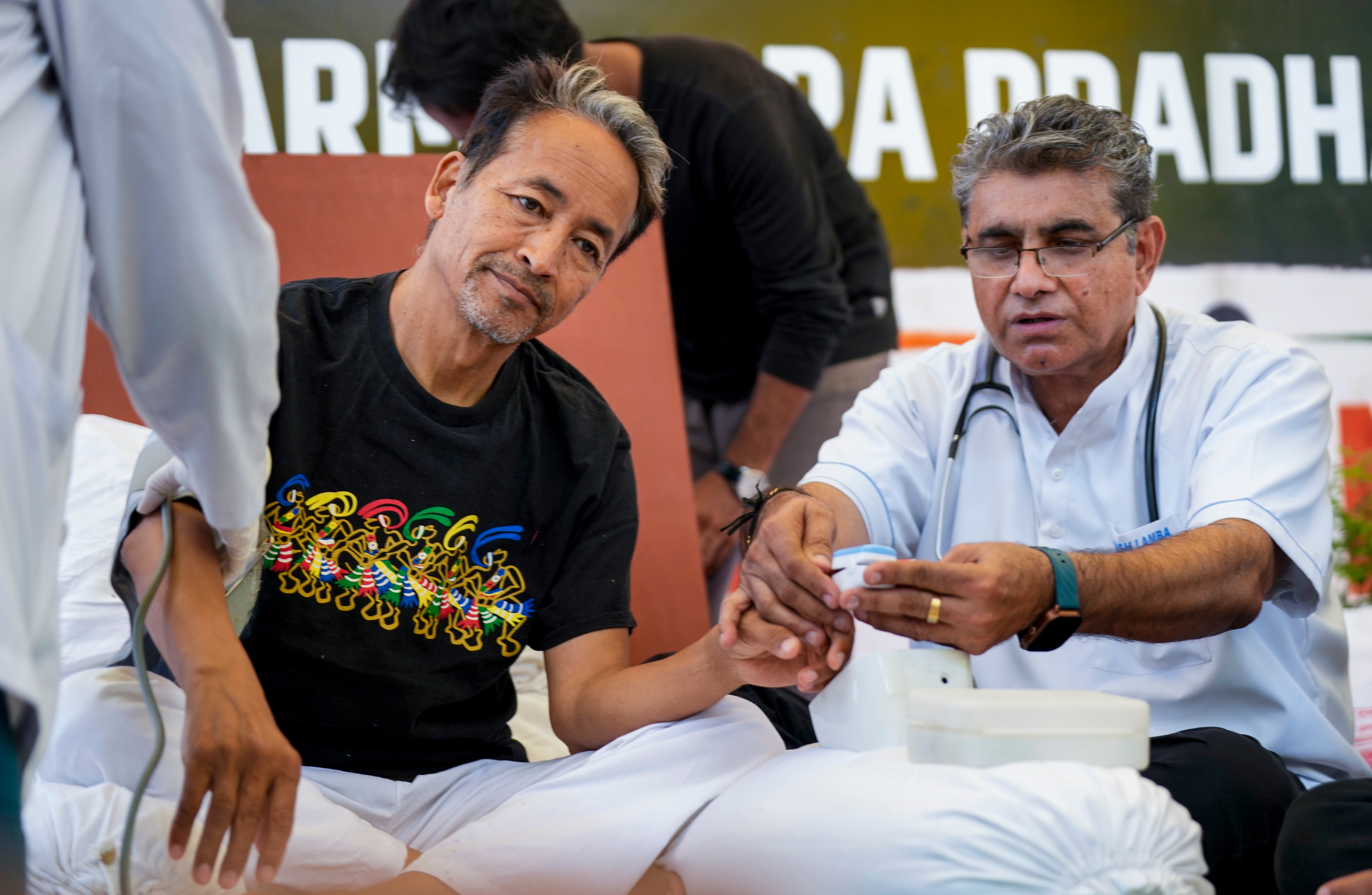 Activist Sonam Wangchuk is examined by medical professionals during a Cockroach Janata Party (CJP) protest demanding the resignation of Union Education Minister Dharmendra Pradhan over alleged irregularities in the NEET exam and other issues, at Jantar Mantar in New Delhi on Friday, July 17, 2026. (Salman Ali/PTI Photo) Activist Sonam Wangchuk is examined by medical professionals during a Cockroach Janata Party (CJP) protest demanding the resignation of Union Education Minister Dharmendra Pradhan over alleged irregularities in the NEET exam and other issues, at Jantar Mantar in New Delhi on Friday, July 17, 2026. (Salman Ali/PTI Photo)