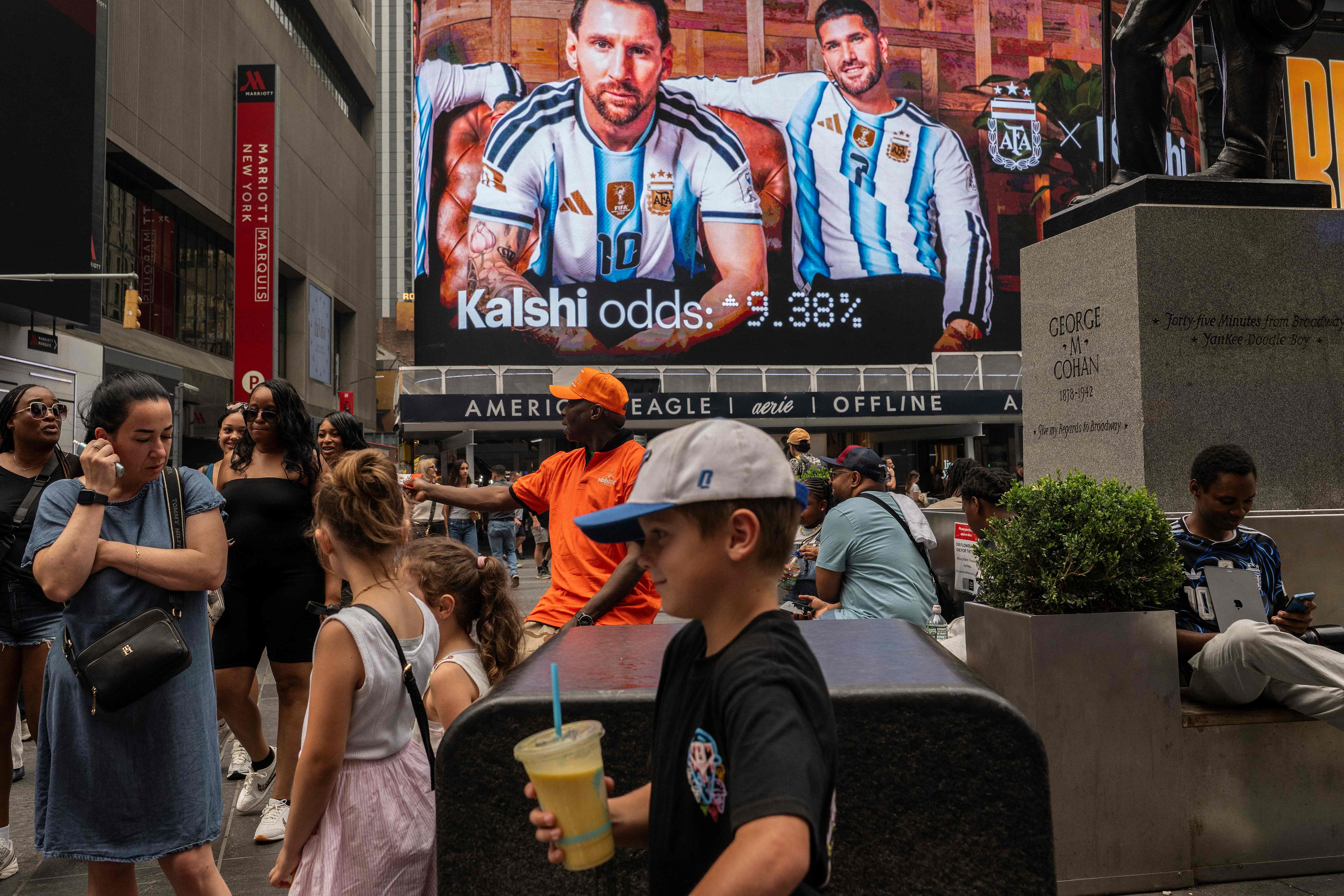 NEW YORK, NEW YORK - JULY 16: Members of the public walk past an advertisement of Lionel Messi in Times Square on July 16, 2026 in New York City. Much of the East Coast and Canada is under an Air Quality Health Advisory as the Canadian and Great Lakes wildfire smoke gradually moves through the area, creating a thick haze in the heat. The region is experiencing temperatures with heat indexes over 100 degrees as it confronts another heat wave. David Ramos/Getty Images/AFP (Photo by David Ramos / GETTY IMAGES NORTH AMERICA / Getty Images via AFP) (Getty Images via AFP) NEW YORK, NEW YORK - JULY 16: Members of the public walk past an advertisement of Lionel Messi in Times Square on July 16, 2026 in New York City. Much of the East Coast and Canada is under an Air Quality Health Advisory as the Canadian and Great Lakes wildfire smoke gradually moves through the area, creating a thick haze in the heat. The region is experiencing temperatures with heat indexes over 100 degrees as it confronts another heat wave. David Ramos/Getty Images/AFP (Photo by David Ramos / GETTY IMAGES NORTH AMERICA / Getty Images via AFP) (Getty Images via AFP)