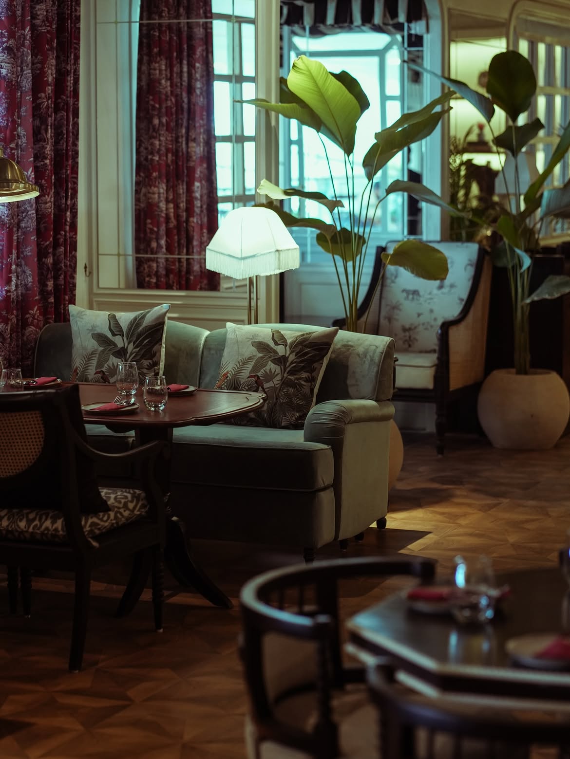 Cosy, inviting, and steeped in charm — Pincode Bengaluru’s interior borrows elegant strokes from its colonial past with plush seating, warm lighting, and leafy accents. (Pic: Pincode Bengaluru) Cosy, inviting, and steeped in charm — Pincode Bengaluru’s interior borrows elegant strokes from its colonial past with plush seating, warm lighting, and leafy accents. (Pic: Pincode Bengaluru)