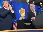 President Donald Trump and FIFA President Gianni Infantino speak at a FIFA reception event.
