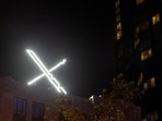 'X' logo is seen on the top of the headquarters of the messaging platform X, formerly known as Twitter, in downtown San Francisco, California.