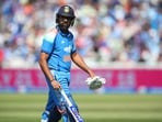  Rohit Sharma walks back to the pavilion after losing his wicket.