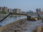 Mumbai, India - May 18, 2023: State of Maharashtra Hon. Chief Minister Eknath Shinde along with Brihanmumbai Municipal Corporation Commissioner and Administrator Iqbal Singh Chahal inspecting the desilting works of Mithi River at BKC in Mumbai, India, on Thursday, May 18, 2023. (Photo by Satish Bate/ Hindustan Times) (Hindustan Times)