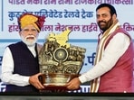 Prime Minister Narendra Modi being felicitated with a memento by Haryana chief minister Nayab Singh Saini in Jind on Friday. (PTI)