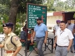 Punjab Police inspector Gurinderjit Singh Nagra (in black cap) being taken to hospital for a checkup at Dasuya after his arrest on Saturday. He has been remanded in three days’ police custody. (HT Photo)