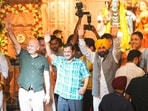 Punjab chief minister Bhagwant Mann with AAP national convener Arvind Kejriwal and party leader Manish Sisodia during the 'Ek Shaam Shiv Ke Naam' event in Pathankot on Friday. (@msisodia X)
