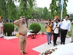 The DGP was in Karnal, where he paid tributes to the 82 martyrs at the police martyrs memorial of the Haryana Police Academy, Madhuban and observed two minutes of silence. (HT Photo)