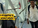 His first airport photo came with an unexpected helping hand.