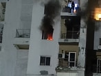 Videos of the incident were shared on social media, showing thick smoke inside the apartment. (HT)
