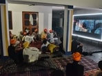 Villagers watch a special screening of the film ‘Satluj’ at a gurdwara in Tatley village in Punjab's Gurdaspur district. (AP)