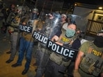 ICE agents guard Delaney Hall, a detention facility in Newark, N.J.