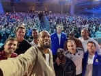 L-R: Rodri, Tom Brady, Novak Djokovic, Kevin Durant, Emiliano Martinez, Kevin Hart, Travis Scott, Michael Rubin, Rio Ferdinand, and Lionel Messi