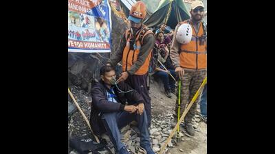 A member of Jammu and Kashmir Police’s Mountain Rescue Team administers oxygen to a pilgrim during the Amarnath Yatra on the Pahalgam route in Anantnag district on Friday. (PTI Photo) A member of Jammu and Kashmir Police’s Mountain Rescue Team administers oxygen to a pilgrim during the Amarnath Yatra on the Pahalgam route in Anantnag district on Friday. (PTI Photo)