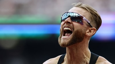 Britain's Josh Kerr celebrates after winning the men's one mile event during the IAAF Diamond League athletics competition at the London stadium in London on July 18, 2026. (AFP) Britain's Josh Kerr celebrates after winning the men's one mile event during the IAAF Diamond League athletics competition at the London stadium in London on July 18, 2026. (AFP)