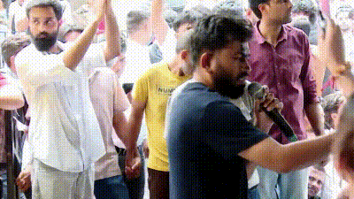 The incident briefly disrupted the programme as supporters rushed towards the stage, triggering commotion. (PTI) The incident briefly disrupted the programme as supporters rushed towards the stage, triggering commotion. (PTI)