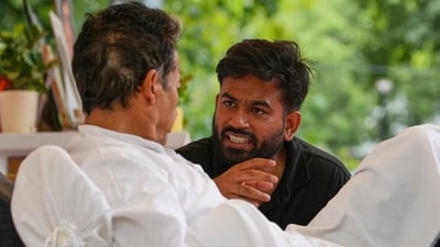 Abhijit Deepki, founder of the Kokroche Janta Party, center, talks to climate activist Sonam Wangchuk. (AP)