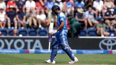 India’s Rohit Sharma walks off the pitch after being caught out by England's Jos Buttler during the second ODI. (AP) India’s Rohit Sharma walks off the pitch after being caught out by England's Jos Buttler during the second ODI. (AP)