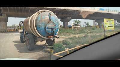 Residents claimed tanker operators damaged a drain slab near Sector 110. HSPCB said no formal complaint has been received in the matter. (HT) Residents claimed tanker operators damaged a drain slab near Sector 110. HSPCB said no formal complaint has been received in the matter. (HT)