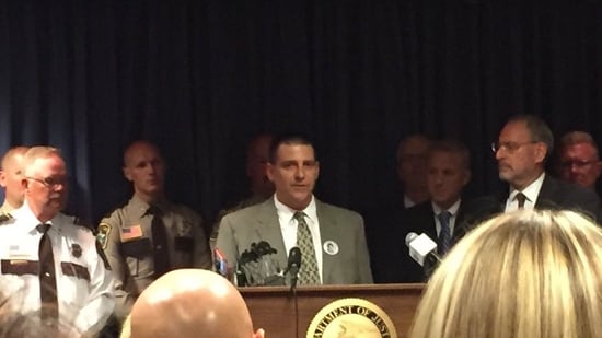 Following Danny Heinrich's court admissions, Jared Scheierl speaks with the media in September 2016.