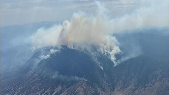 Smoke rises from the French Bar Creek wildfire (K70748) northwest of Cache Creek, British Columbia, Canada. (REUTERS)