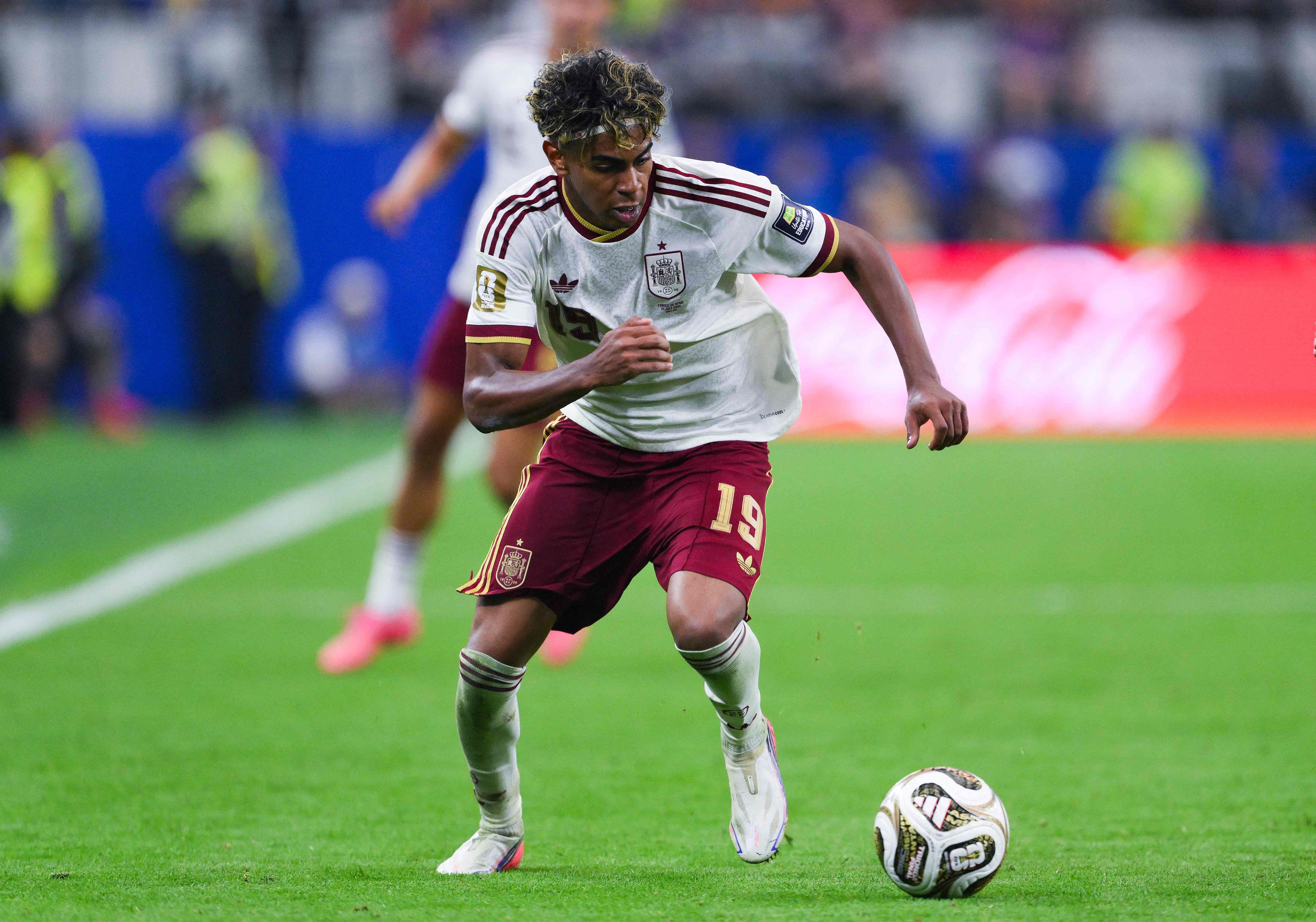 Lamine Yamal #19 of Spain runs with the ball. (Getty Images via AFP) Lamine Yamal #19 of Spain runs with the ball. (Getty Images via AFP)