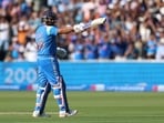 India's Rohit Sharma celebrates reaching his century during the third ODI. India's Rohit Sharma celebrates reaching his century during the third ODI.