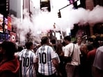 Argentina fans wearing Lionel Messi jerseys walk around New York ahead of the Fifa World Cup 2026 final against Spain, at Times Square in New York City.