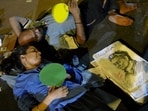 CJP supporters rest during a protest demanding Union Education Minister Dharmendra Pradhan's resignation over alleged irregularities in the NEET examination, at the Jantar Mantar.