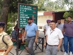 Punjab Police inspector Gurinderjit Singh Nagra (in black cap) being taken to hospital for a checkup at Dasuya after his arrest on Saturday. He has been remanded in three days’ police custody.