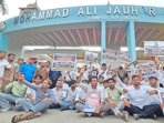 Students gathered on the campus demanding that authorities revoke the demolition order. (HT)
