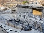 US-Iran war LIVE:A heavily-damaged bridge which was hit by a US strike is pictured along the road connecting Roudan and Bandar Abbas in southern Iran on July 18, 2026. (AFP)