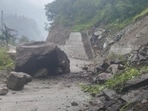 The stretch of road closed due to landslide and boulder fall near Ojri on Sunday morning in Uttarkashi district. (HT picture)