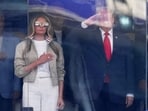 President Donald Trump, right, and first lady Melania Trump attend the World Cup championship final.
