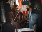Educationist Gitanjali J Angmo, wife of Sonam Wangchuk who remains in hospital, speaking with CJP founder Abhijeet Dipke at the protest site at Jantar Mantar.
