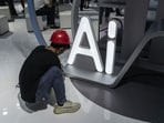 AI governance will emerge through repeated bargains over access, safety and public use. [Photo credit: Bloomberg]