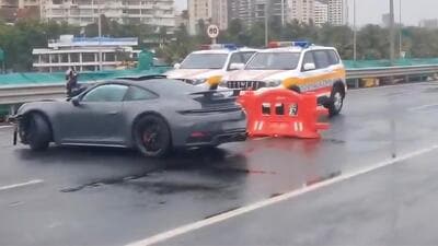 A luxury Porsche crashed into a barricade on Mumbai’s Coastal Road on Sunday morning