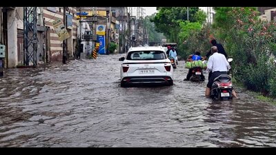 A waterlogged road in Transport Nagar after the rain in Ludhiana on Sunday. (GURPREET SINGH/HT)