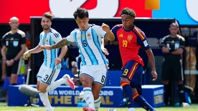Argentina defender Lisandro Martínez (6) and Spain forward Lamine Yamal (19) vie for the ball during first half FIFA World Cup final action. (Frank Gunn/The Canadian Press vi) Argentina defender Lisandro Martínez (6) and Spain forward Lamine Yamal (19) vie for the ball during first half FIFA World Cup final action. (Frank Gunn/The Canadian Press vi)