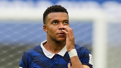 Kylian Mbappe walks off the pitch after the World Cup third-place playoff match. (AP Photo/Rebecca Blackwell)