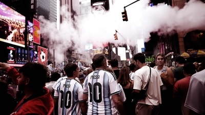 Argentina fans wearing Lionel Messi jerseys walk around New York ahead of the Fifa World Cup 2026 final against Spain, at Times Square in New York City. (Getty Images via AFP)