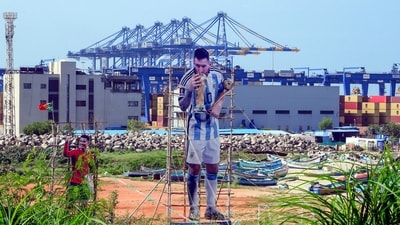 A towering portrait of Argentine soccer player Lionel Messi stands near the Vizhinjam International Port before the final match of the 2026 World Cup, in Thiruvananthapuram, Kerala, Sunday, July 19. (PTI) A towering portrait of Argentine soccer player Lionel Messi stands near the Vizhinjam International Port before the final match of the 2026 World Cup, in Thiruvananthapuram, Kerala, Sunday, July 19. (PTI)